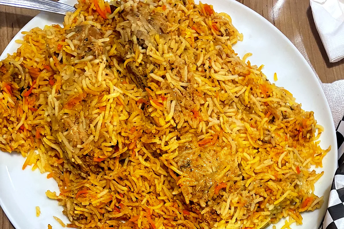 Plate of biryani rice with saffron-coloured grains