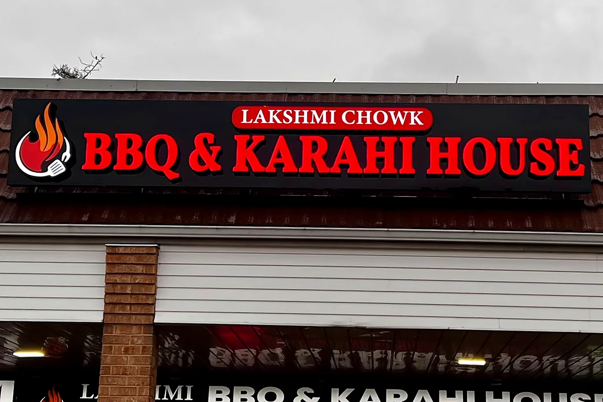 Lakshmi Chowk BBQ & Karahi House sign above the restaurant on Wilson Street West, Ancaster