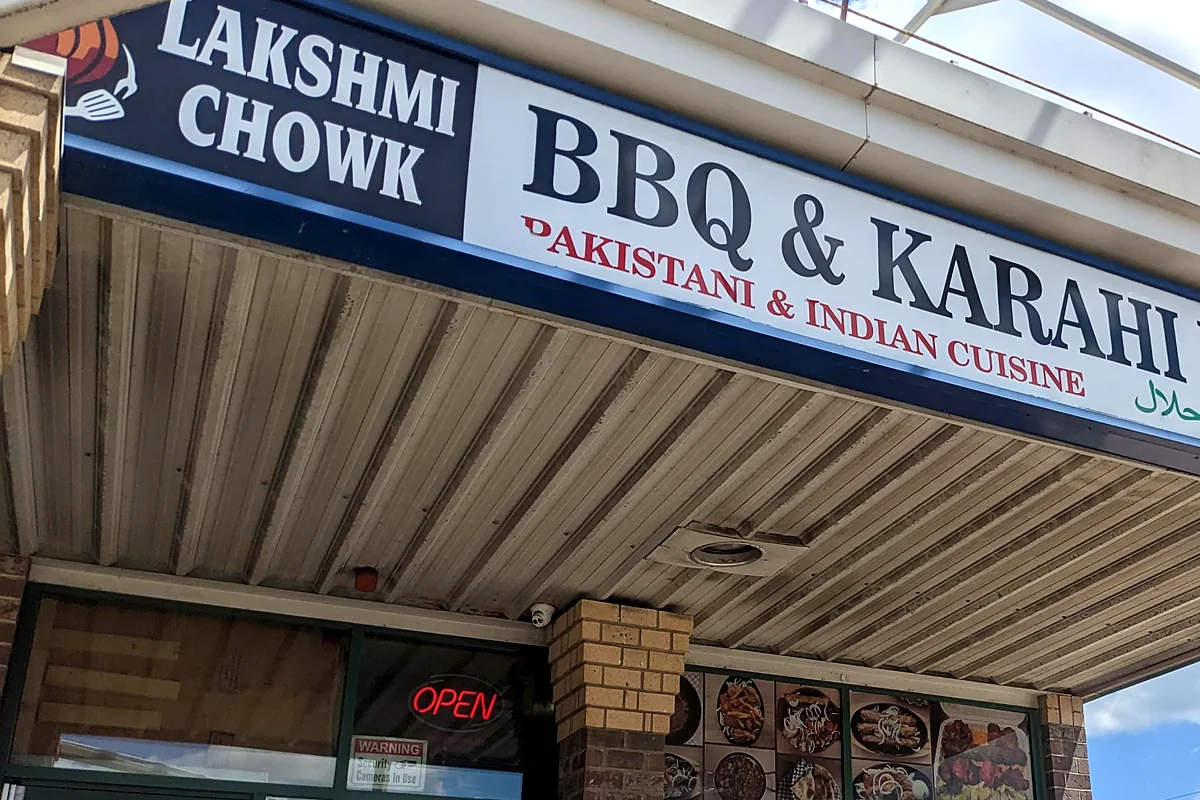 Lakshmi Chowk BBQ & Karahi House storefront sign on Barton Street East, Hamilton